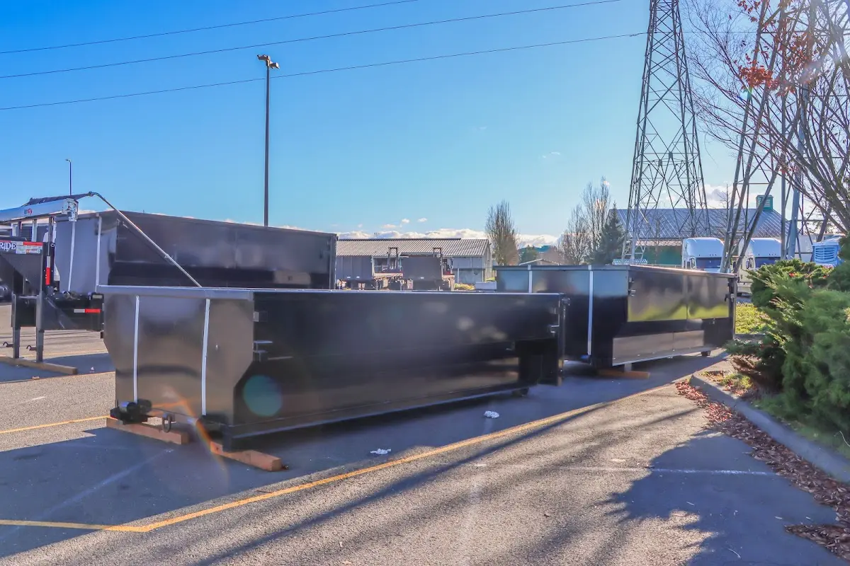 Roll-off dumpster ready for waste disposal at job site for Construction Dumpster Rental in South Kensington